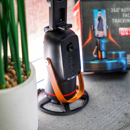 Автоматична въртяща се стойка за телефон с функция за 360° проследяване на лице и движение чрез команди.